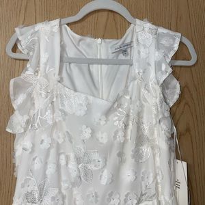 White short sleeve dress new with tags. In great condition